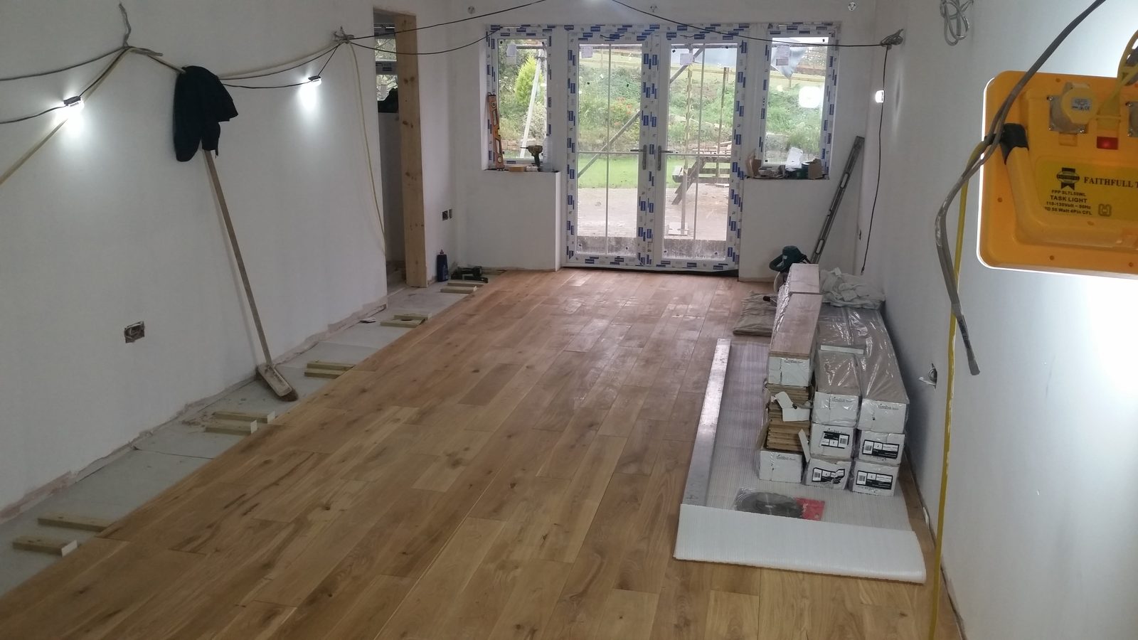 Solid oak flooring mid-installation
