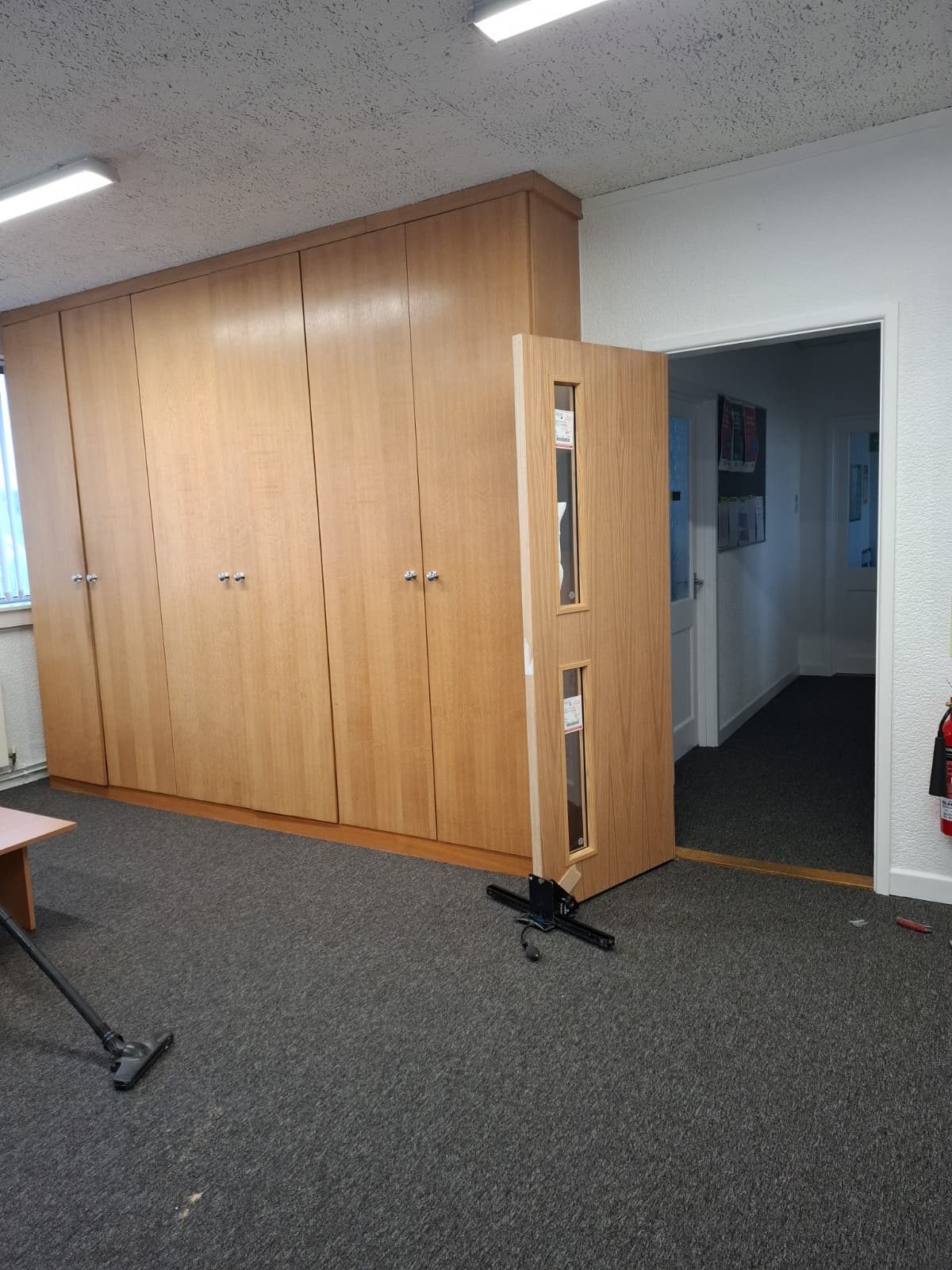 Fitted oak cupboards and fire door installation